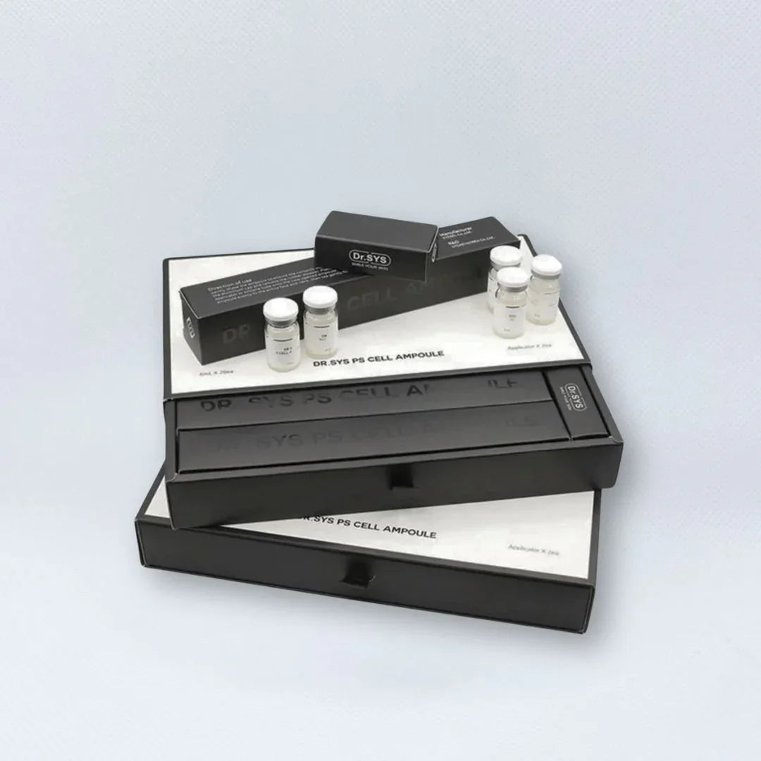 Cosmetic product packaging with bottles and boxes on a light gray background