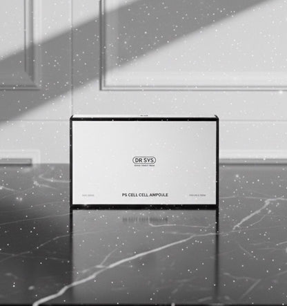 DR. SYS PS CELL CELL AMPOULE packaging on a marble surface with light patterns