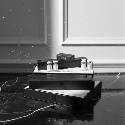 Black and white product display on a marble surface with a neutral background